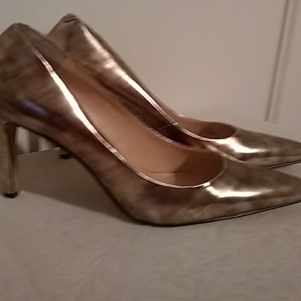 Vince Camuto gold pumps